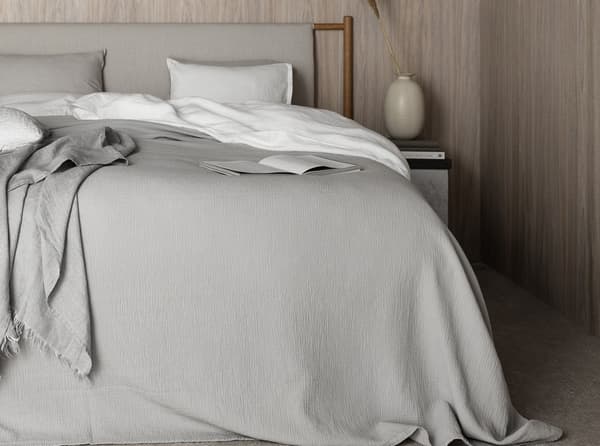 Bedroom interior with the DUX bed model 5005 and Anna headboard